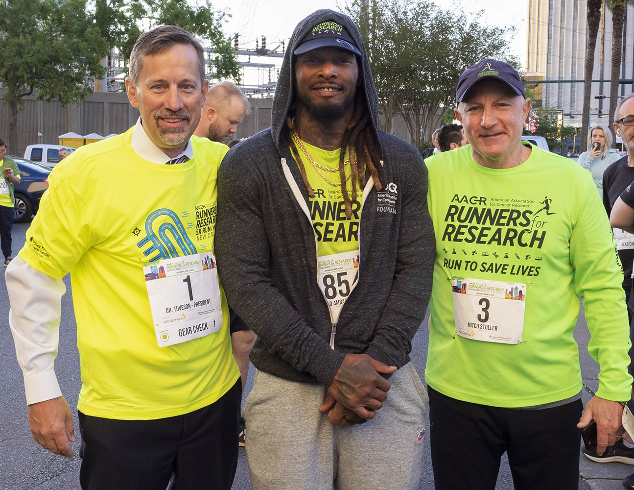 AACR President David A. Tuveson, NFL running back Brandon Bolden, and AACR Chief Philanthropic Officer Mitch Stoller
